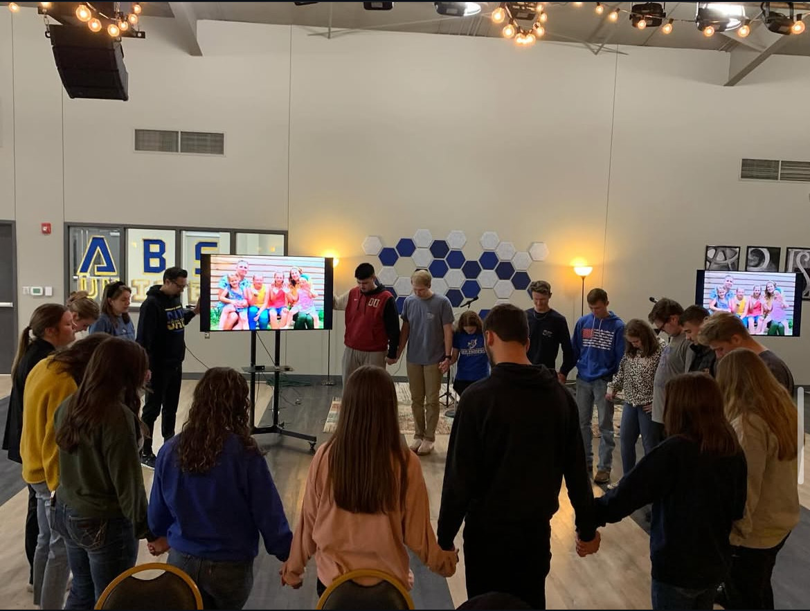 Students praying together